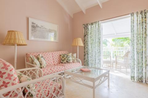 This image shows a well-decorated room with a tropical or beach house style