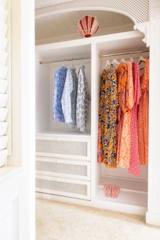 This image shows the interior of a well-organized wardrobe or closet