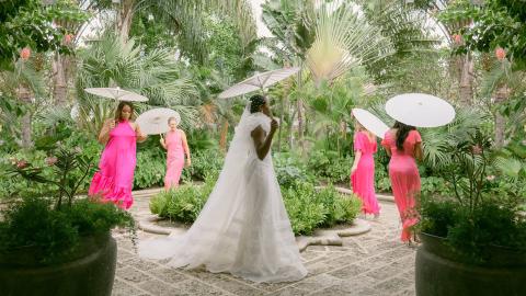 This image features a serene outdoor setting that appears to be part of a wedding celebration