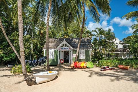 This image depicts a tropical beach scene