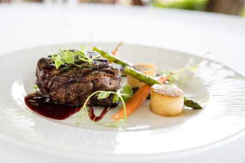 This image features a beautifully plated gourmet dish