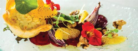 This vibrant image shows a beautifully presented gourmet dish