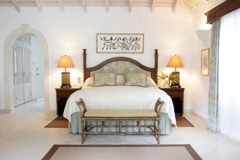 The image depicts a well-decorated bedroom