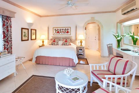 This is an image of a well-furnished and elegant bedroom