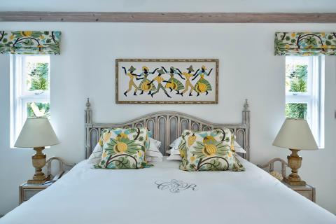 This image features a stylishly decorated bedroom