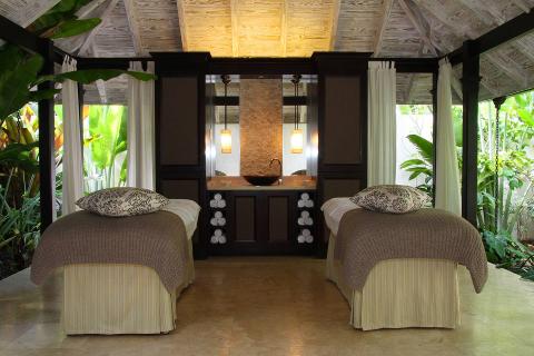 This image showcases a tranquil and beautifully arranged spa treatment room