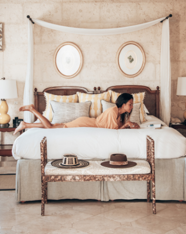 The image shows an elegantly designed bedroom