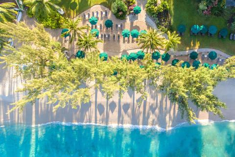 This image shows a beautiful aerial view of a resort or beach setting