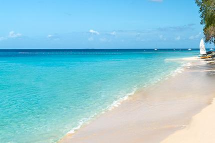 The image shows a beautiful tropical beach scene