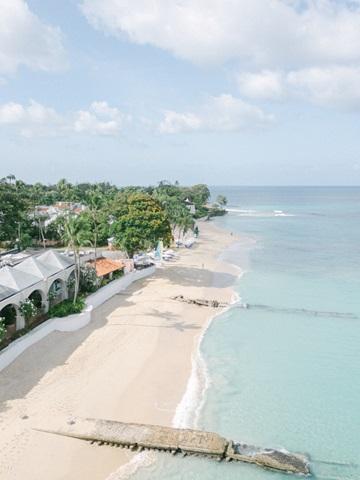 This image shows a serene coastal scene, likely taken from an elevated perspective