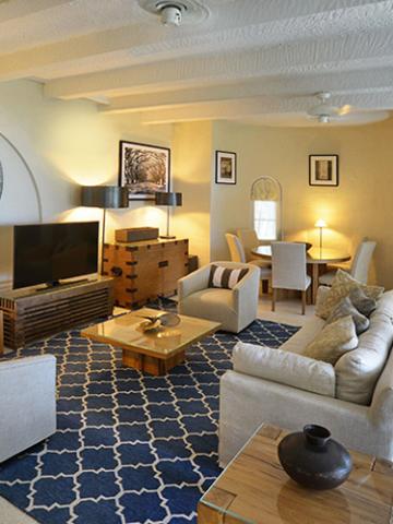 The image shows a stylish living room