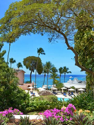 The image shows a beautiful beach resort scene