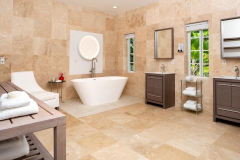 The image shows a luxurious bathroom with a contemporary design