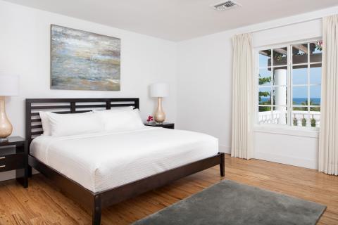 This image features a neatly arranged bedroom
