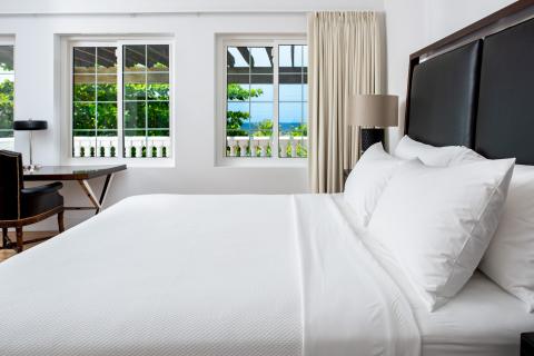 The image shows a beautifully arranged hotel or resort room