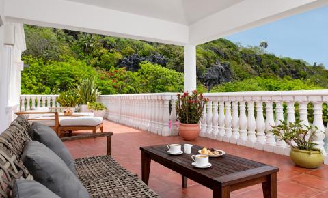 This image shows a scenic outdoor terrace with a relaxing ambiance