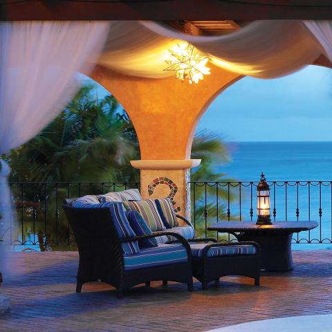 This image shows a beautifully designed outdoor lounge or patio area