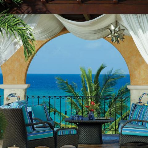 This image shows a luxurious seaside patio