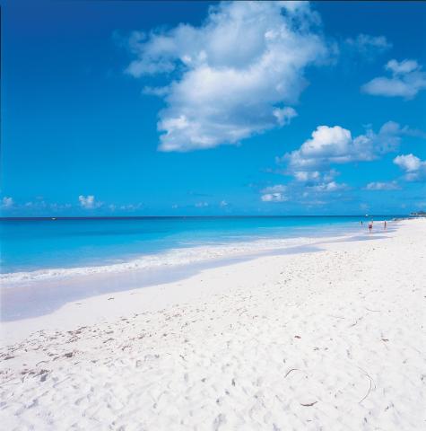 The image shows a beautiful beach scene