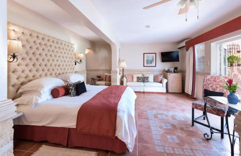 This image depicts a beautifully furnished hotel room