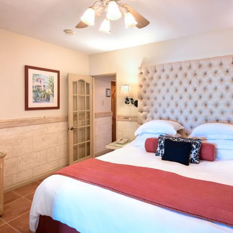 This is an image of a neatly arranged bedroom