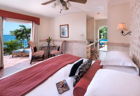This image shows a luxurious and inviting hotel room