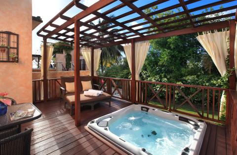 This image shows a luxurious outdoor patio area