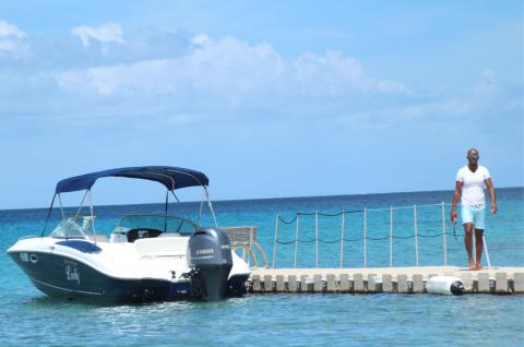 The image shows a beautiful, clear day at the beach