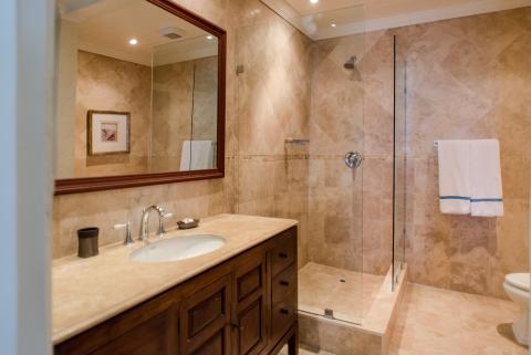The image displays a modern bathroom interior
