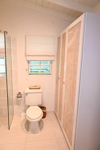 The image shows a modern bathroom interior