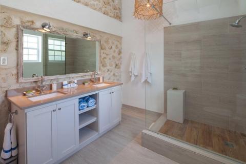 The image shows a stylish bathroom interior