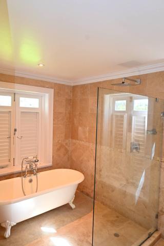 This image shows a luxurious, spacious bathroom