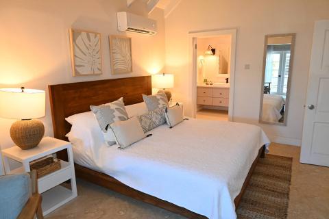 This image shows a neatly arranged bedroom