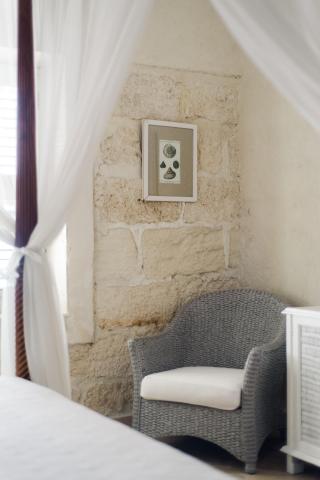 The image depicts a serene and elegantly decorated interior space, probably part of a home or a boutique hotel