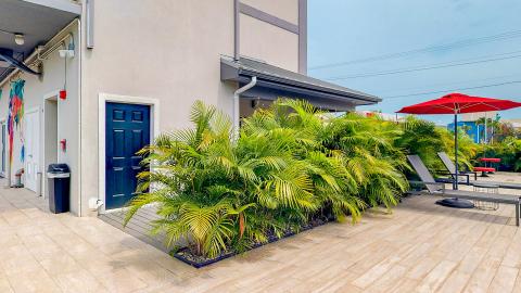 This image shows an outdoor patio area adjacent to a building