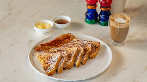 This image features a breakfast setting with several items