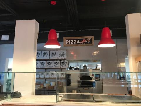 This image shows the interior of a pizza restaurant