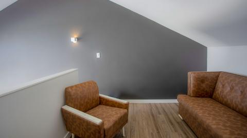 This image depicts an indoor room with modern furnishings