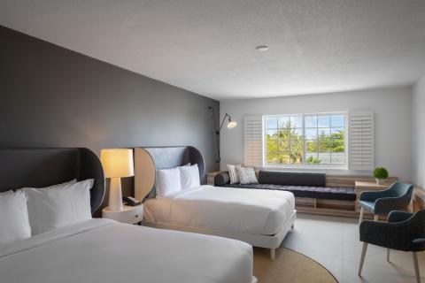 This image features a modern, nicely decorated bedroom