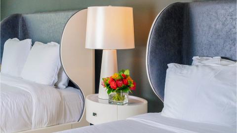This image features a neatly arranged bedroom setting