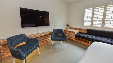 This image shows a modern living room or lounge area
