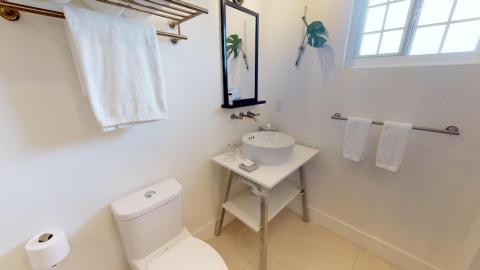 This image shows a neatly arranged bathroom