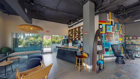 This image shows a stylishly designed interior space, likely a hotel lobby or a lounge area