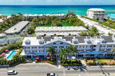 This image shows an aerial view of a coastal resort area