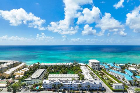 This image features an aerial view of a coastal area with multiple elements of aesthetic and functional interest