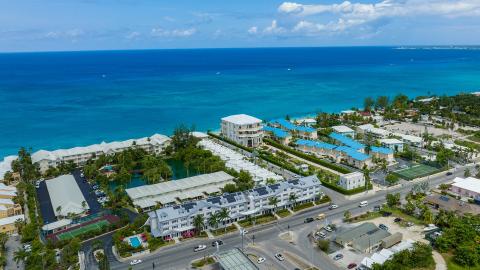 This image shows a coastal resort area with modern infrastructure