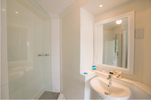 The image shows a modern bathroom