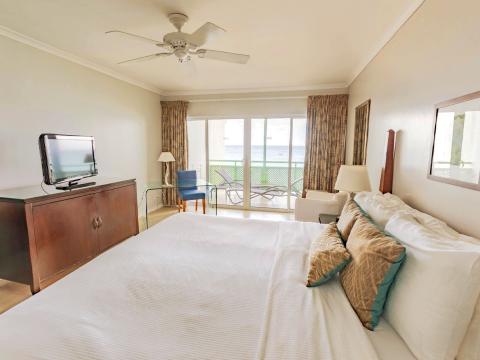 The image shows a neatly arranged hotel or resort room