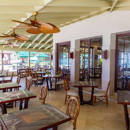 The image shows an indoor dining area, likely within a restaurant or a resort