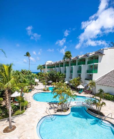 This image features a beautiful tropical resort setting
